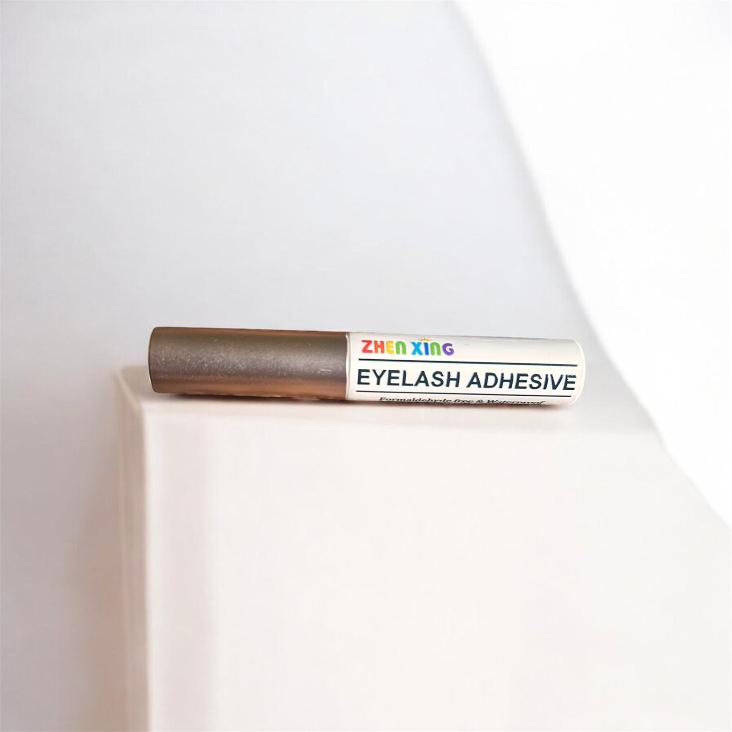 Zhen xing eyelash adhesive